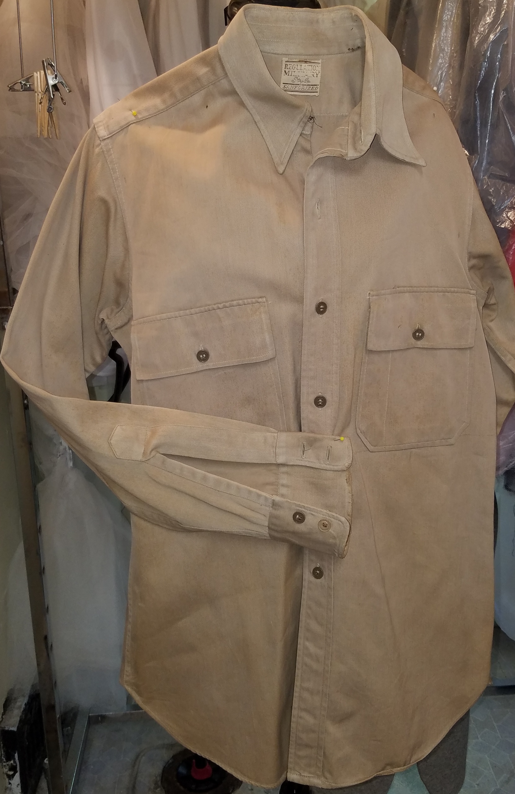 tan military shirt