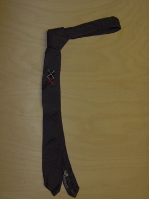 Grey and red and black and white Necktie-TI 2012- solid with argyle pattern in center