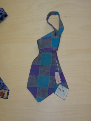 Blue and grey and purple Necktie-TI 4279- squares with leaves and diagonal squiggles