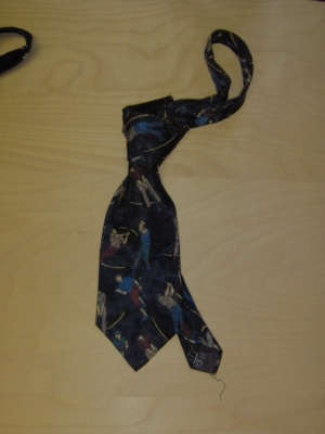 Dark blue and red and tan and green Necktie-TI 4311- Dark tie with golfers.