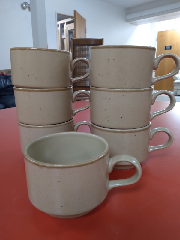 Small beige mugs
