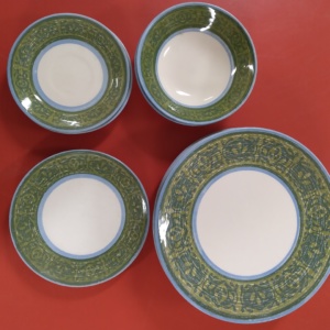 Green-rimmed plates and bowls