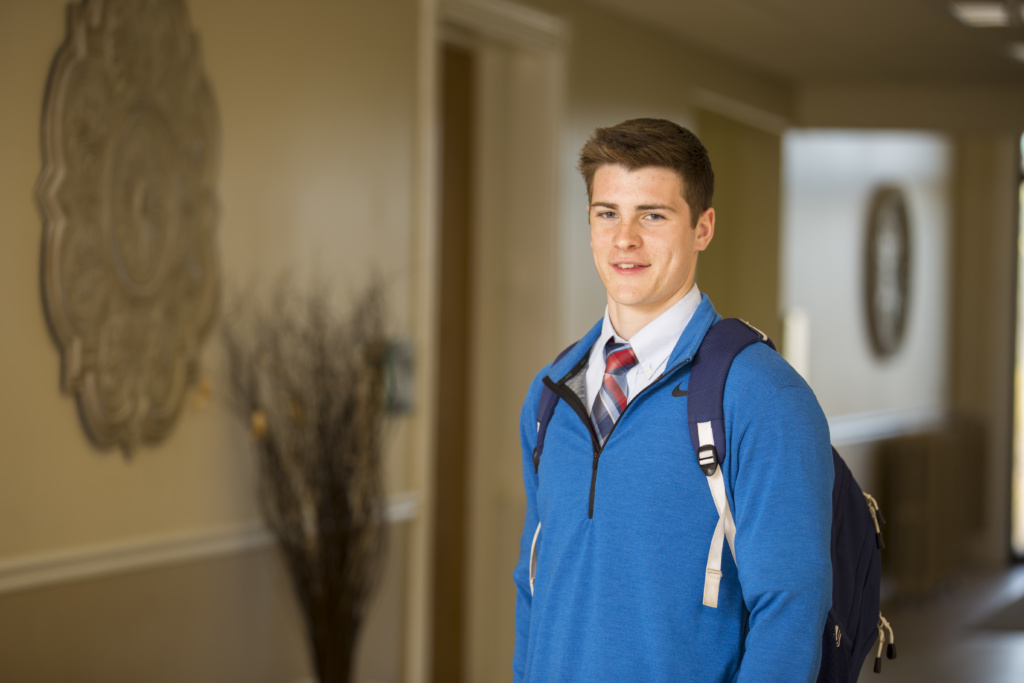 student smiling at camera