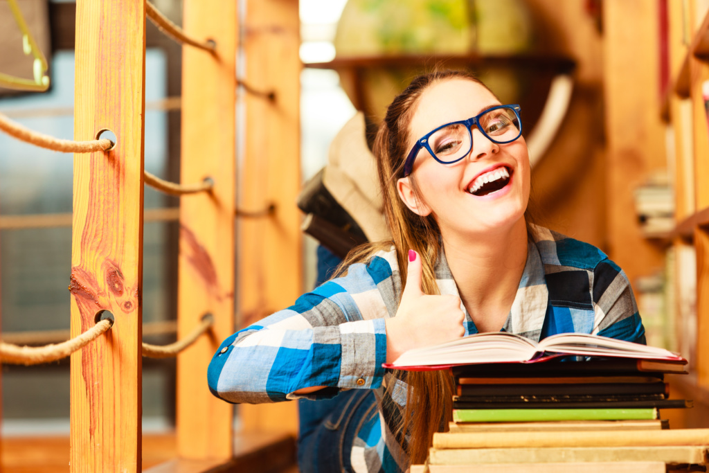 Student with stack of books